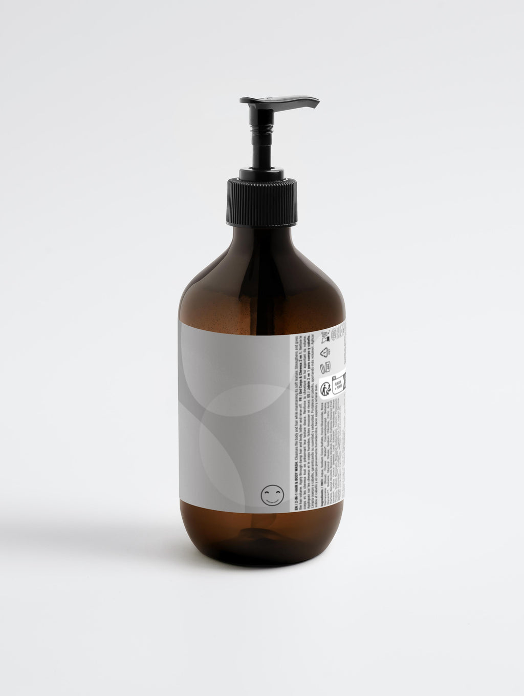 Brown bottle with black pump on a white background