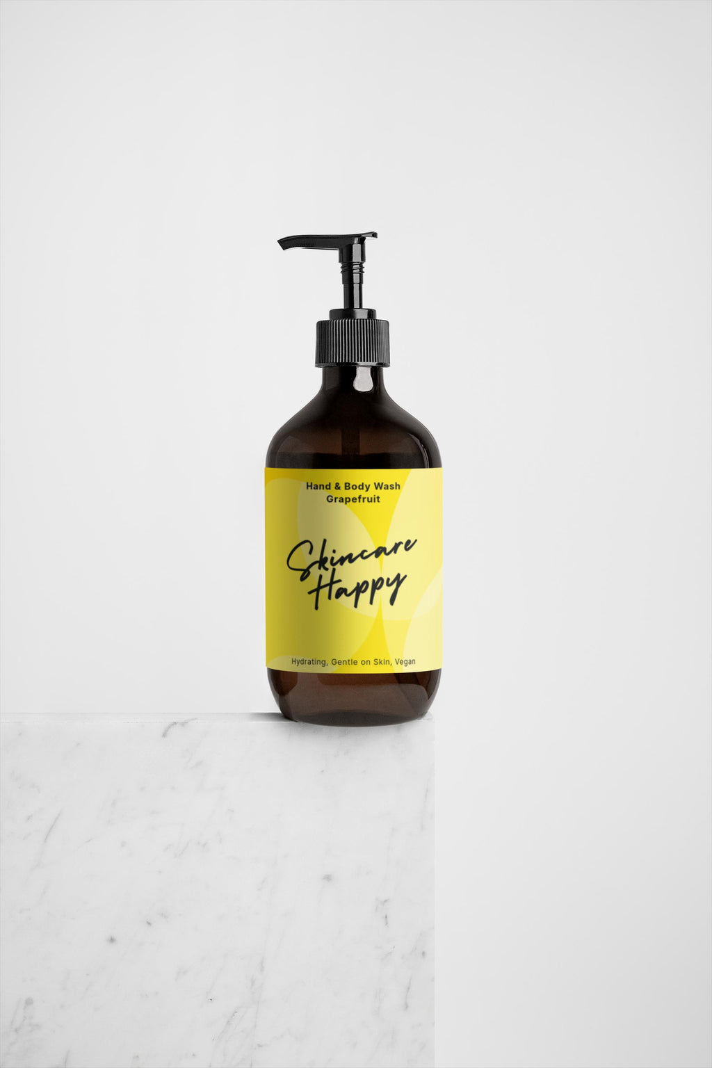 Hand and body wash bottle with a yellow label on a white background