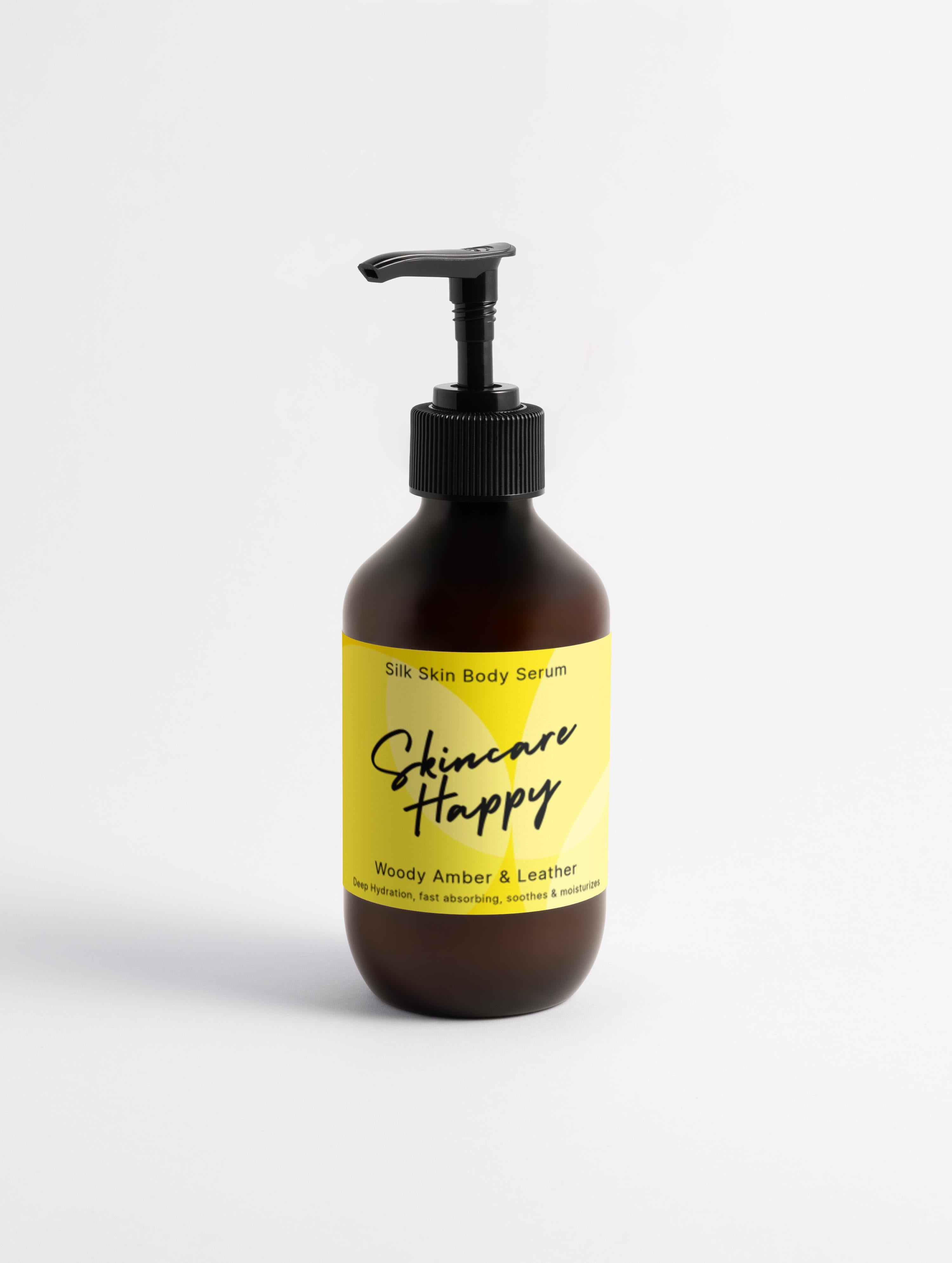 Skincare Happy body serum bottle with yellow label on a white background