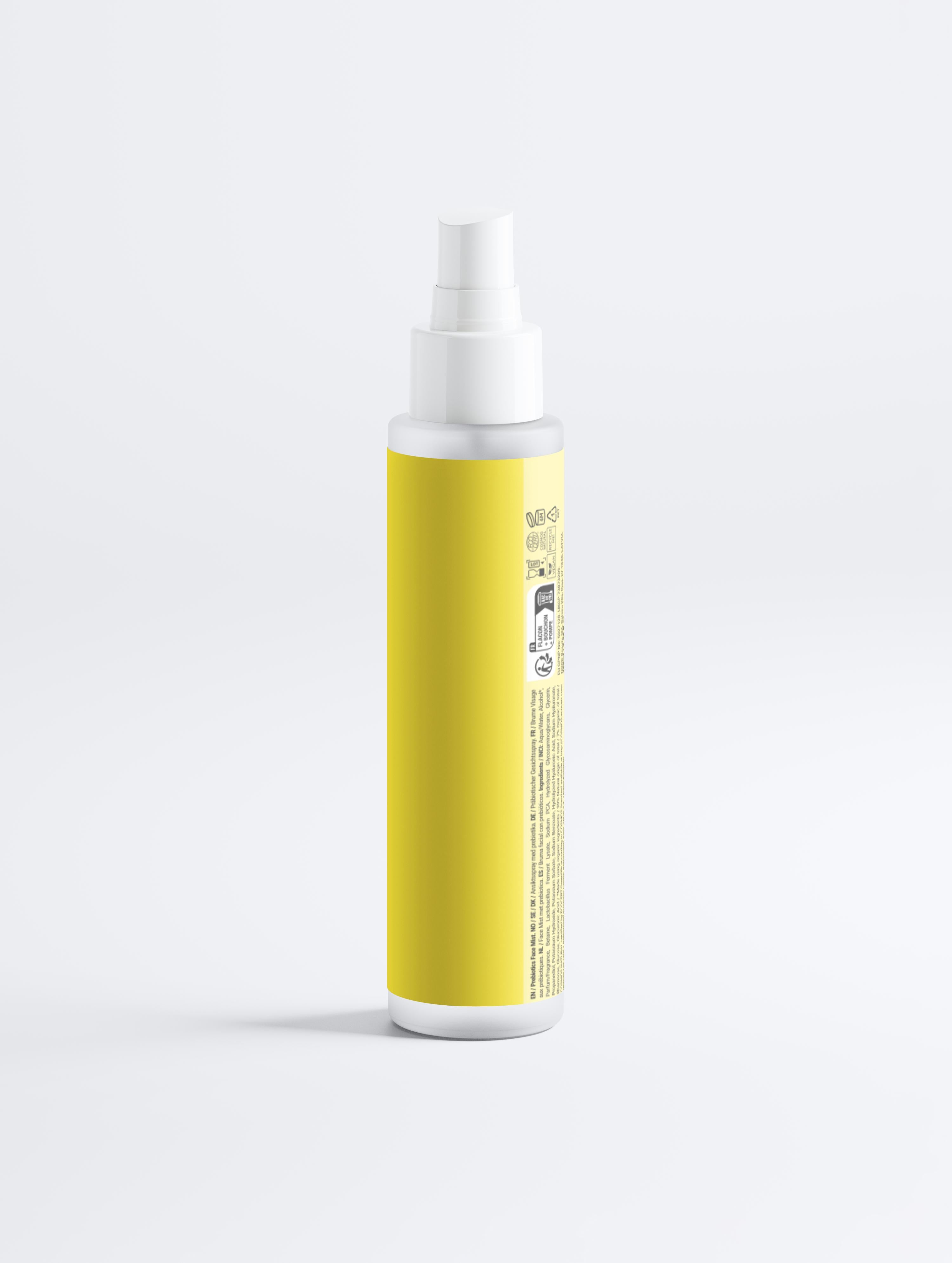 Yellow spray bottle with a white nozzle on a light gray background