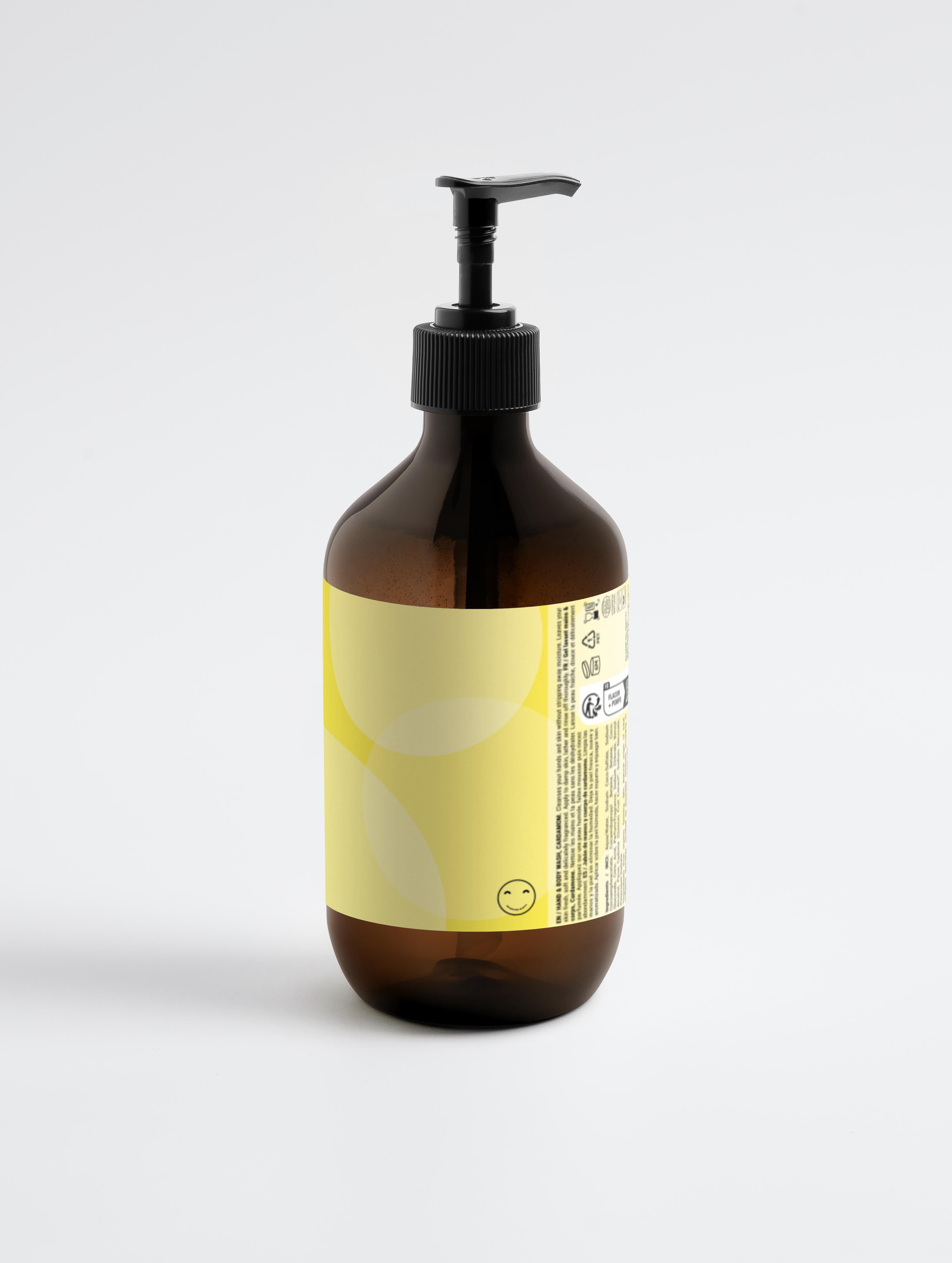 Brown bottle with pump and yellow label on a light gray background
